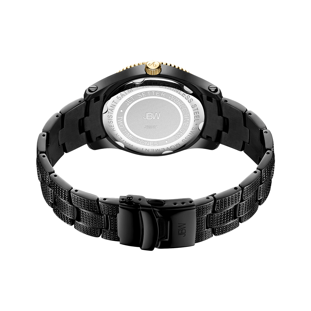 A black metal JBW Jet Setter GMT | J6370C wristwatch is shown from the back, revealing the engraved caseback with brand, model, and specs. The textured link bracelet and clasp are highlighted against a white background.