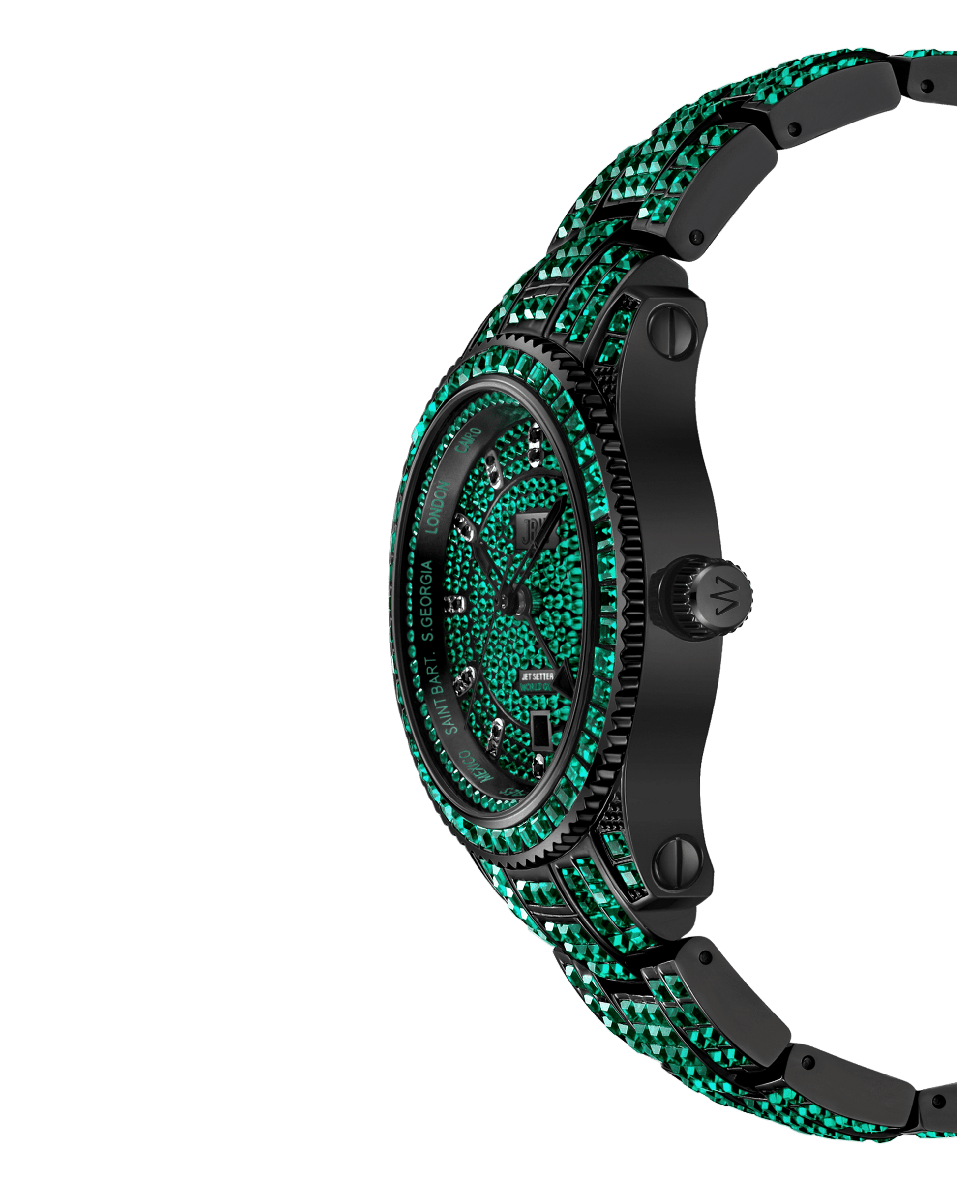 The JBW Watches RESERVE Jet Setter GMT Emerald | R6393C features a black metal case and band, set with green and black gemstones on the bezel and diamond-accented face, shown at an angle against a white background.