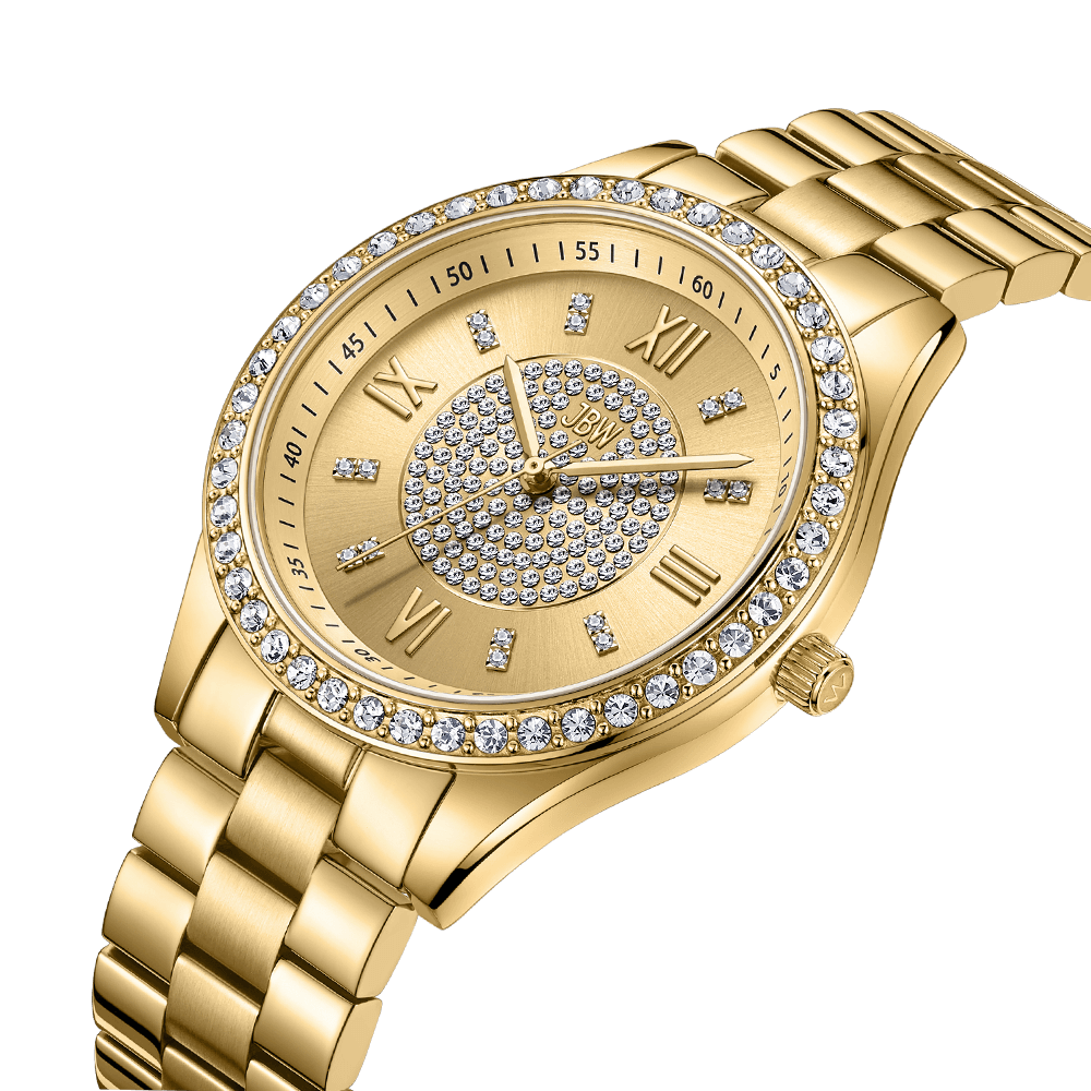 The JBW Mondrian | J6303B is an elegant 18K gold-plated watch featuring a metal link band, round face, Roman numerals, clear crystals on the bezel and dial, and gold hands—a luxurious everyday timepiece.