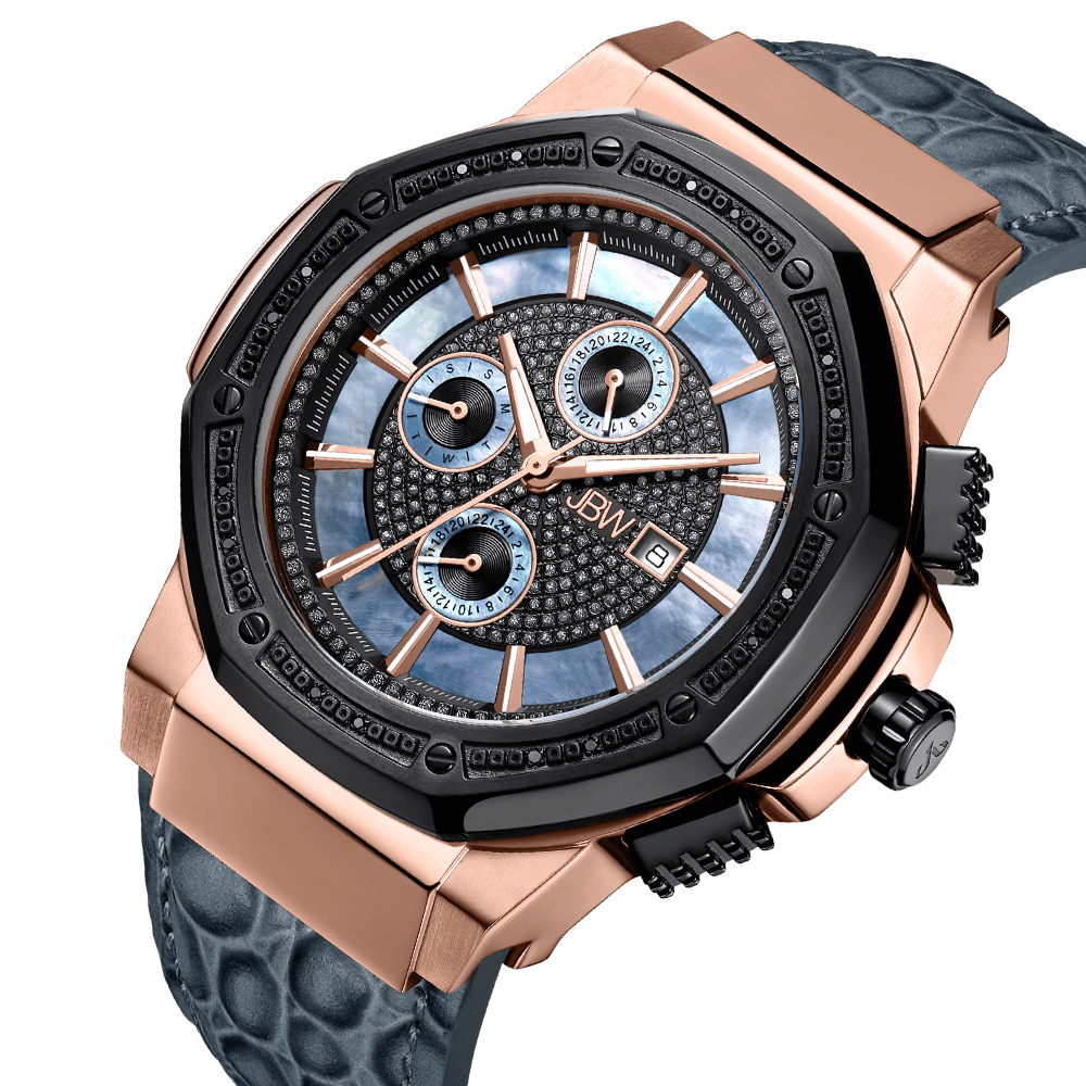 The JBW Saxon 10 YR | JB-6101L-10C is a luxury wristwatch with a rose gold and black case, textured dial, three subdials, date display, and blue patterned genuine leather strap. This 10 Year Anniversary Edition has polished and textured finishes.