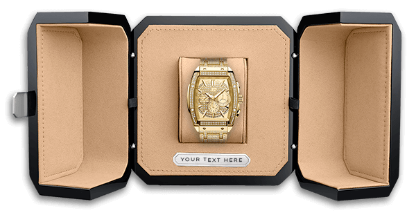 A JBW Watches gold wristwatch with a rectangular face is shown in an open tan and black case, featuring a custom nameplate below the watch. Product: Custom Box Engraving - PS570A.