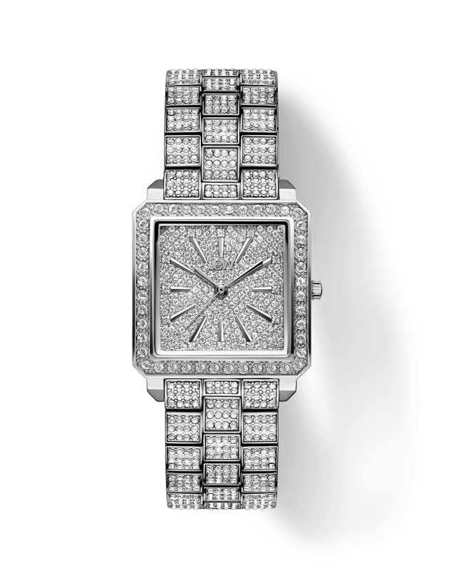 The JBW Cristal 28 | J6386C-GA Sample Sale (Grade A) is a luxury watch with a rectangular diamond-encrusted face and band, Swiss movement, and an elegant look. The timepiece displays the time as 10:12.