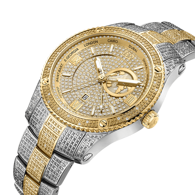 The JBW Jet Setter GMT | J6370D is a two-tone gold-plated stainless steel watch with a diamond-encrusted gold and silver band, Roman numeral dial, small globe design, and date window at 6 o’clock.