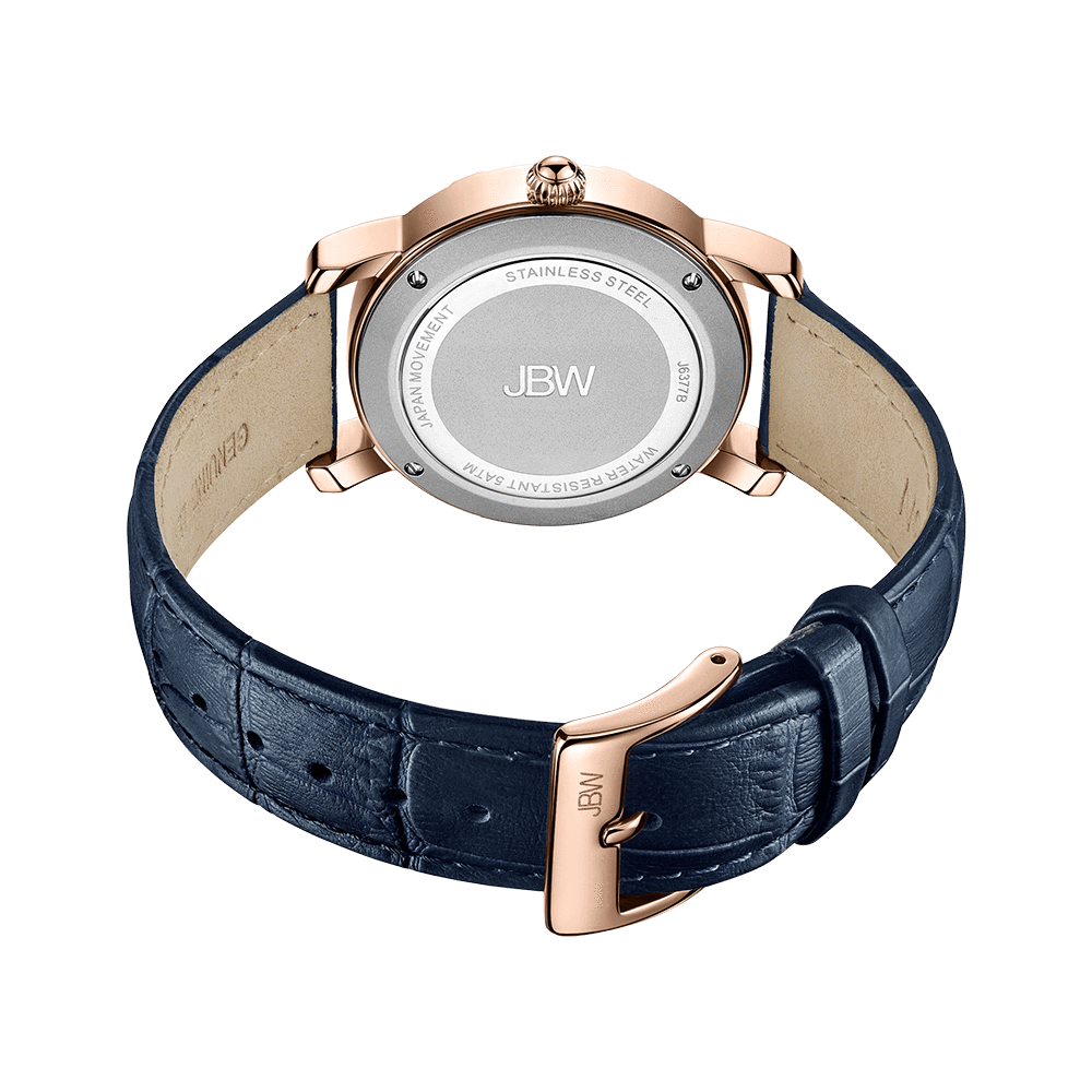 The Olympia | J6377B-SC Sample Sale by JBW Watches features a rose gold case, blue leather strap with visible stitching, a rose gold buckle, and a stainless steel back engraved with JBW, shown from the back on a white background.
