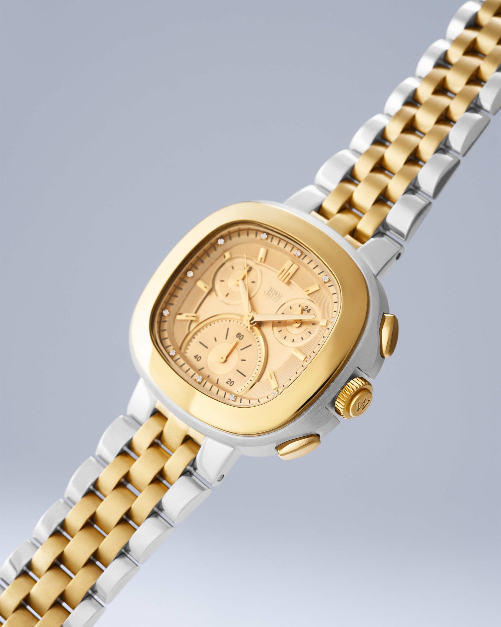 The Coast | J6397C by JBW Watches features a two-tone stainless steel case, square gold face, gold dials, and a mixed gold and silver link band, shown against a light gray background.