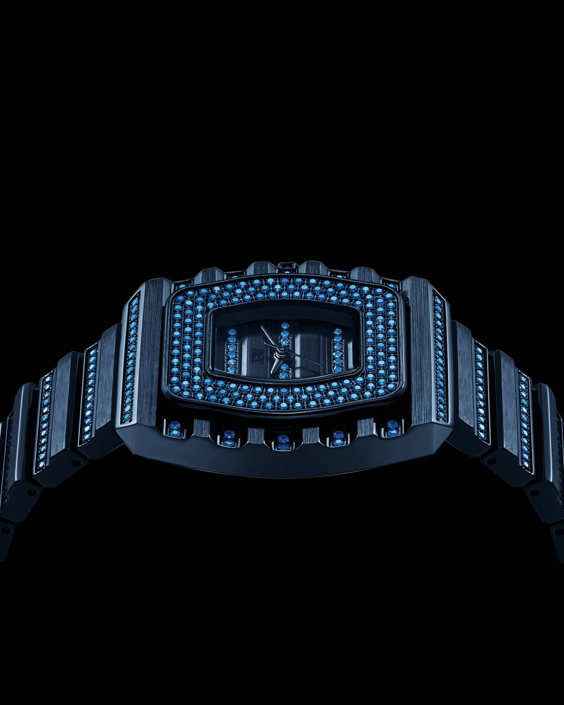 The RESERVE Atlas Bleu | R6404A by JBW Watches is a limited edition blue crystal watch with a black design, adorned with blue gemstones on the face and metal band, showcased elegantly against a black backdrop.