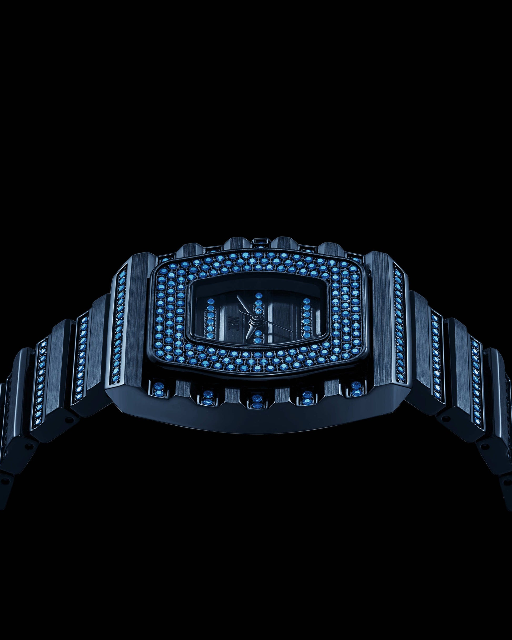 The RESERVE Atlas Bleu | R6404A by JBW Watches is a limited edition blue crystal watch with a black design, adorned with blue gemstones on the face and metal band, showcased elegantly against a black backdrop.