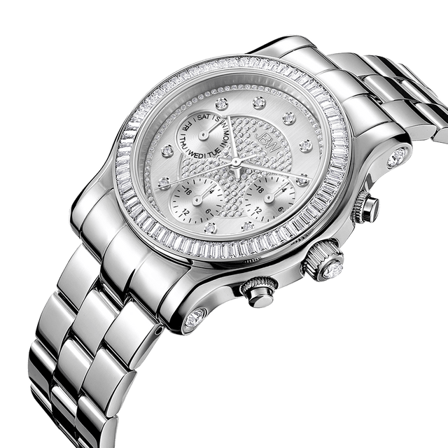 The JBW Laurel | J6330B is a silver metal wristwatch with a round face, baguette crystal bezel, diamond-like hour markers, three subdials, and a stainless steel bracelet, shown against a plain white background.