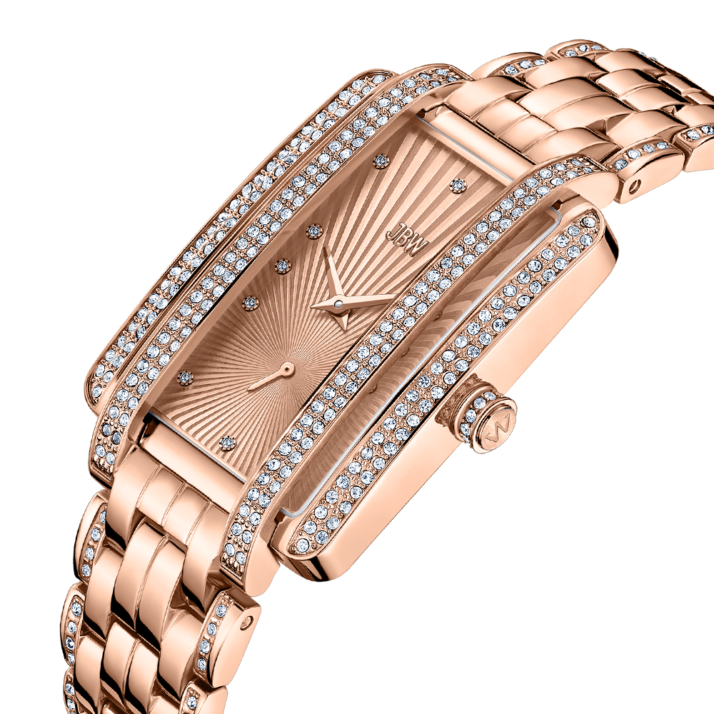 The JBW Mink | J6358C is a luxurious rose gold watch with a textured dial, diamond hour markers, and dazzling diamonds on the bezel and bracelet links. The iconic JBW logo gleams on the face of this stunning timepiece.