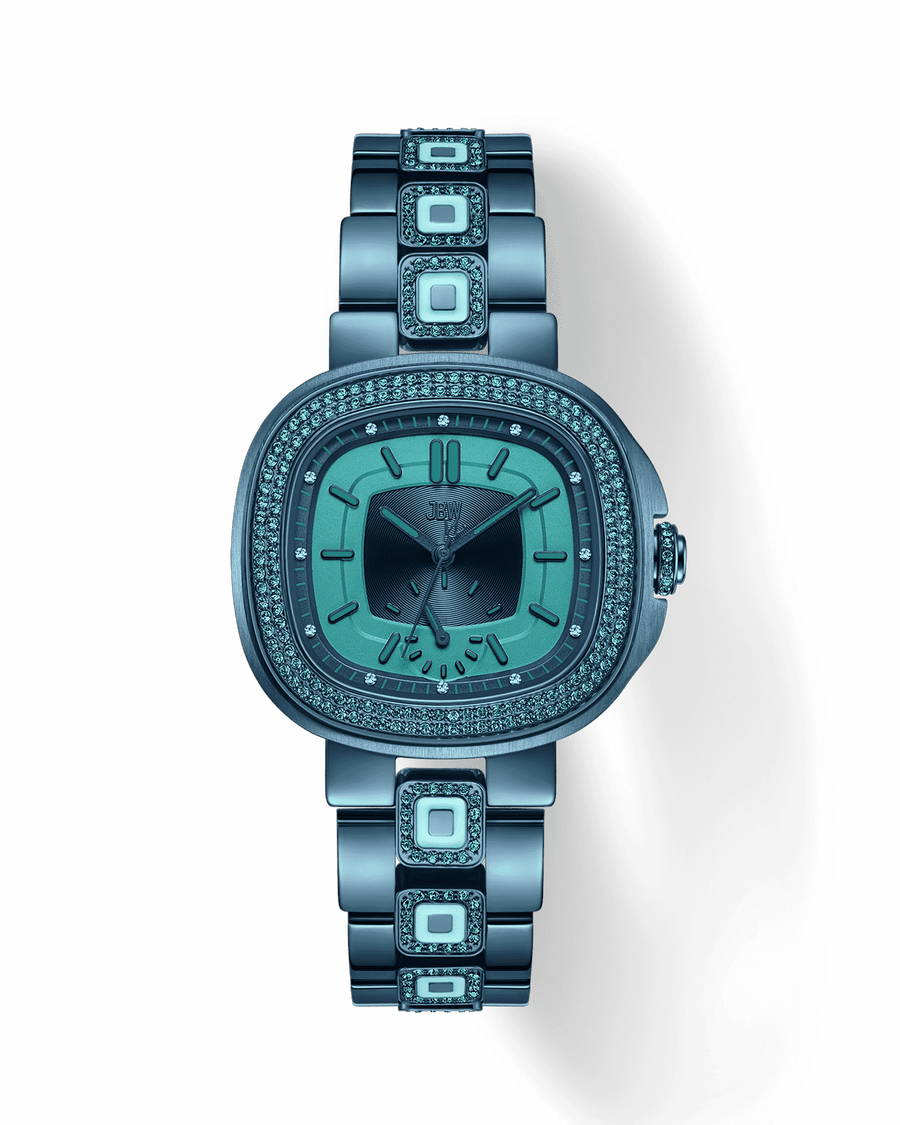The JBW Watches RESERVE Coast Azure | R6402C is a stainless steel wristwatch in metallic blue, with a square bejeweled bezel, indicolite-toned crystals on geometric links, and a minimalist dial featuring baton markers and three hands.