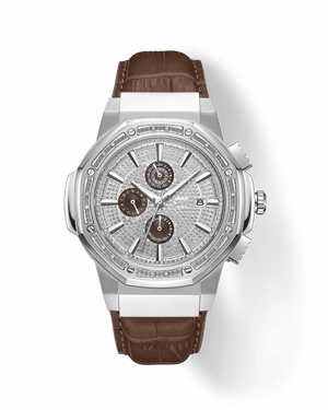 The JBW Saxon | JB-6101L-Q is a luxury timepiece with a silver case, diamond-encrusted face, three subdials, date display, and brown leather strap, showcased on a plain white background.
