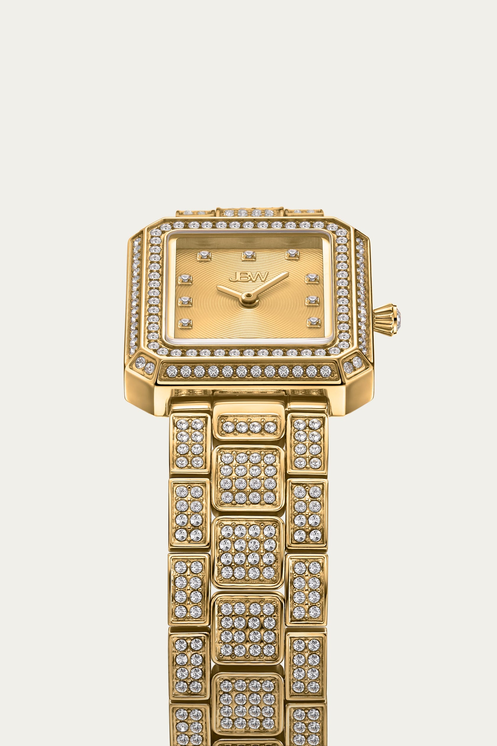 The JBW Watches Arc Single (J6390A-GA Sample Sale) is a luxurious unisex watch with a square, crystal-studded face and gold band, featuring sparkling clear stones, crystal hour markers, and the JBW logo at the center.
